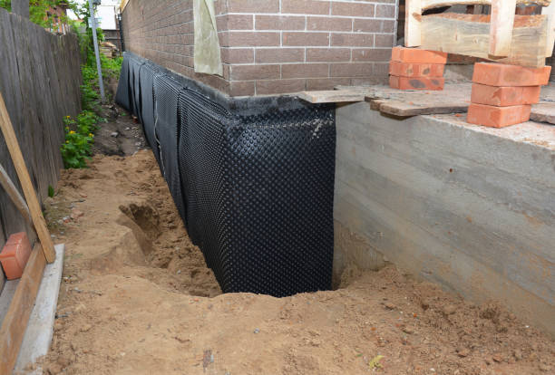 Happy homeowners after waterproofing job in Culleoka